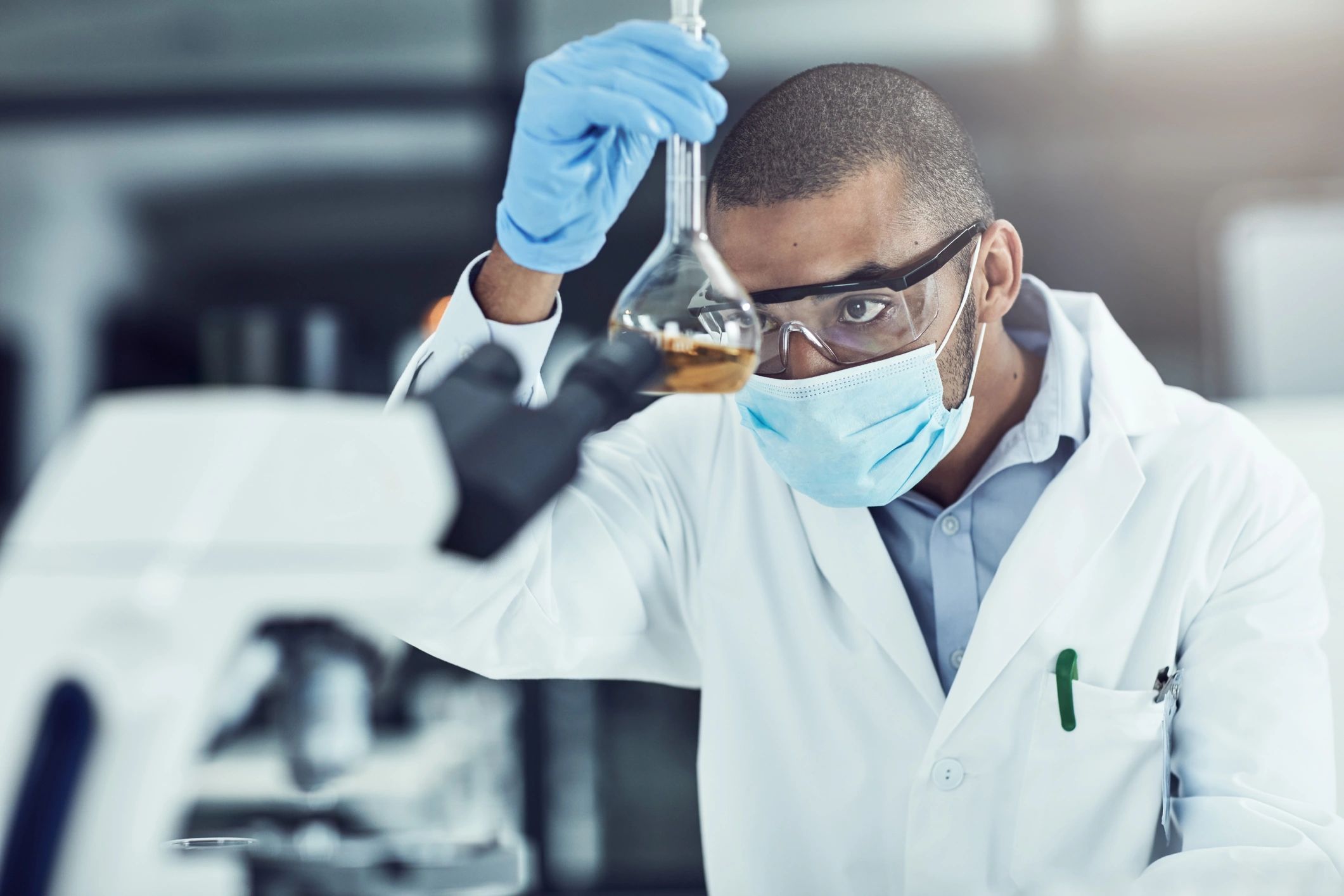 Portrait of a researcher in a lab environment.