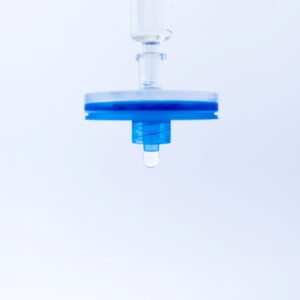 Sterile syringe filter (0.22 µm) isolated on white background.